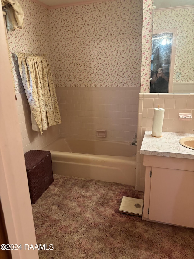 bathroom featuring vanity and a bathing tub