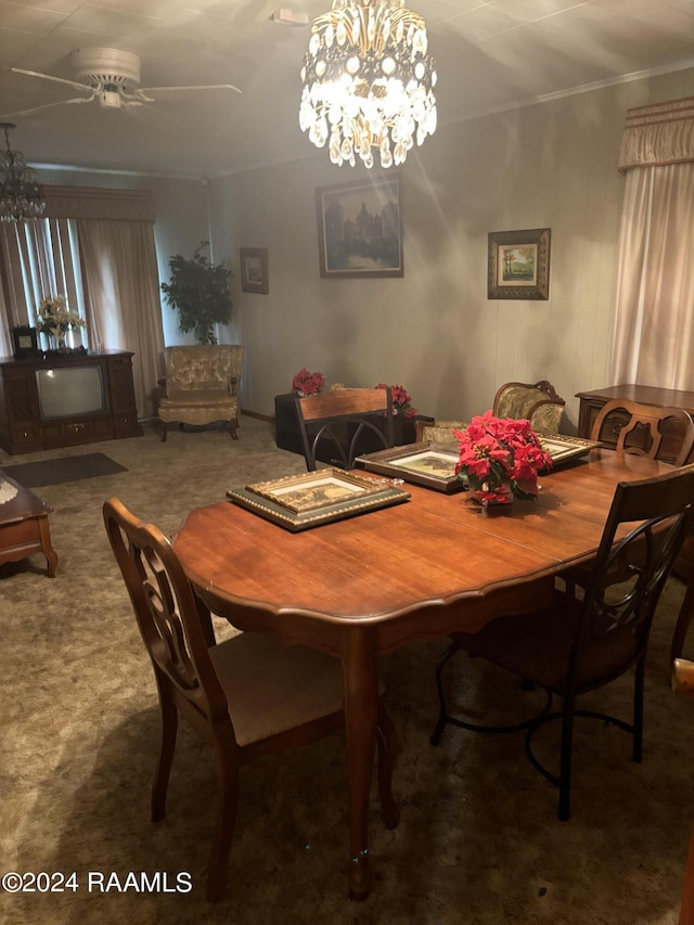 carpeted dining space with a notable chandelier and ornamental molding