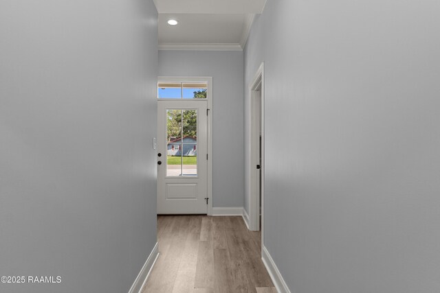210 E D St, Rayne, LA 70578 - entryway featuring recessed lighting, baseboards, ornamental molding, and light wood-style flooring