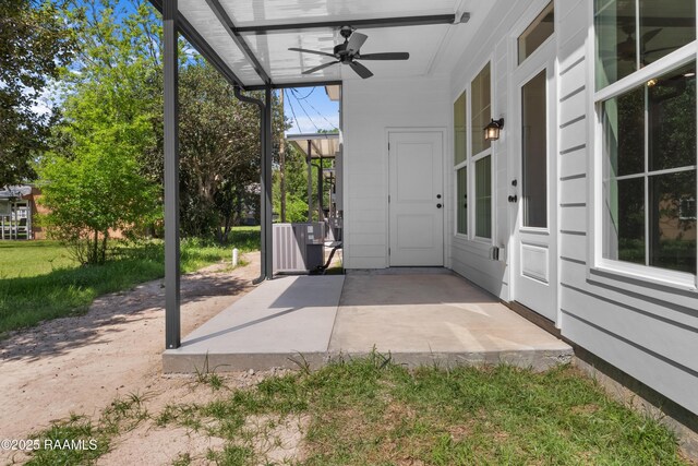 210 E D St, Rayne, LA 70578 - view of patio featuring a ceiling fan and cooling unit