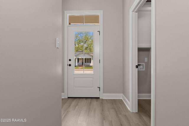 210 E D St, Rayne, LA 70578 - entryway with light wood-type flooring and baseboards