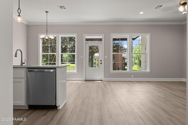 210 E D St, Rayne, LA 70578 - doorway featuring light wood-style flooring, visible vents, and a sink