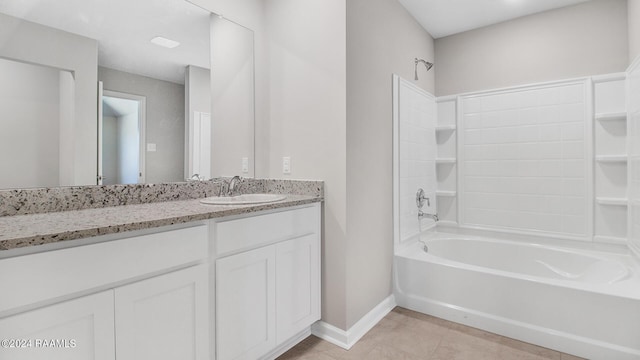 bathroom with tile patterned floors, vanity, and bathtub / shower combination