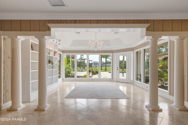 120 Kimball Dr, Lafayette, LA 70508 - doorway to outside with healthy amount of natural light, ornamental molding, decorative columns, and baseboards