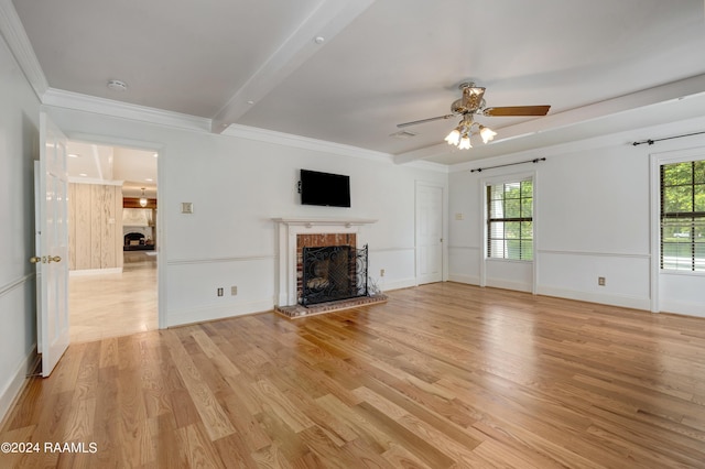 120 Kimball Dr, Lafayette, LA 70508 - unfurnished living room featuring a brick fireplace, ceiling fan, light wood-type flooring, crown molding, and baseboards