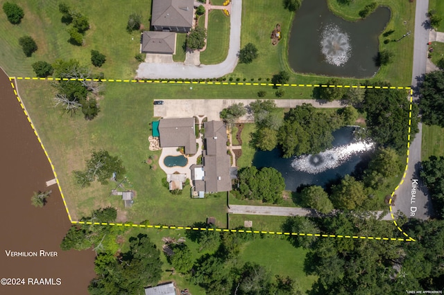 birds eye view of property featuring a water view