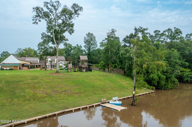 120 Kimball Dr, Lafayette, LA 70508 - dock area with a water view, a playground, and a yard