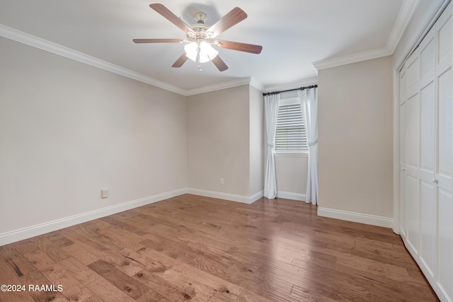 120 Kimball Dr, Lafayette, LA 70508 - unfurnished bedroom featuring ornamental molding, light wood-style flooring, baseboards, and ceiling fan