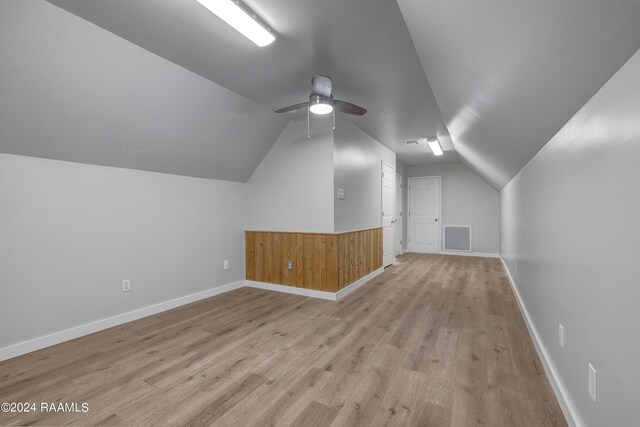 120 Kimball Dr, Lafayette, LA 70508 - additional living space with vaulted ceiling, a ceiling fan, light wood-style floors, and baseboards