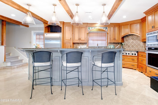 kitchen with beamed ceiling, built in appliances, dark stone counters, a spacious island, and decorative light fixtures