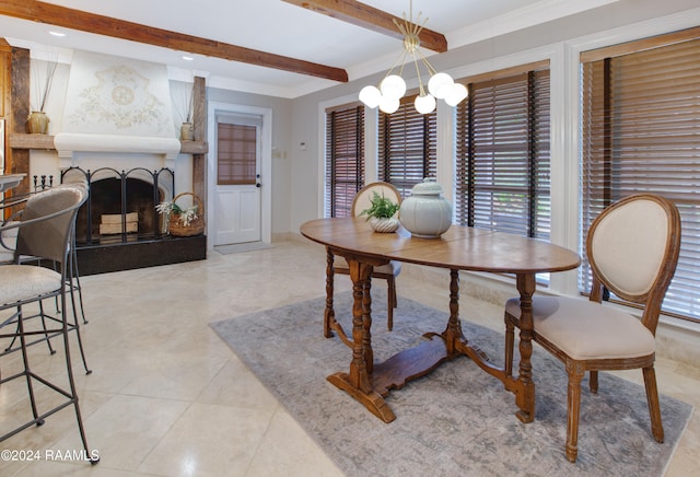 tiled dining area featuring beam ceiling, a fireplace, ornamental molding, and an inviting chandelier