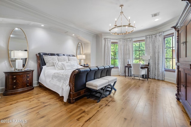 bedroom with crown molding, a notable chandelier, and light wood-type flooring