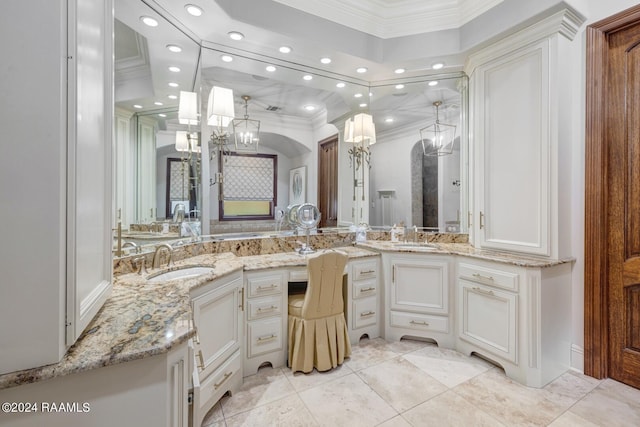 bathroom with tile patterned floors, vanity, and crown molding