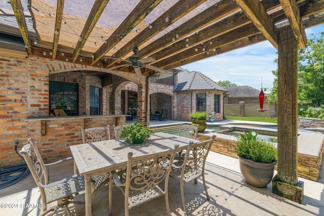 view of patio with a pergola, ceiling fan, and a pool with hot tub