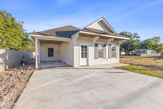 back of property featuring a patio area