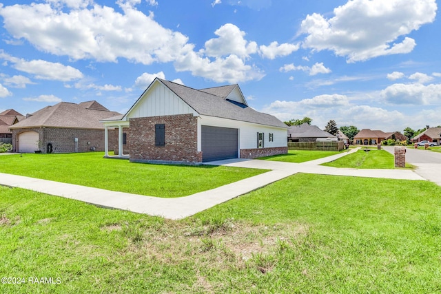 view of side of property with a yard