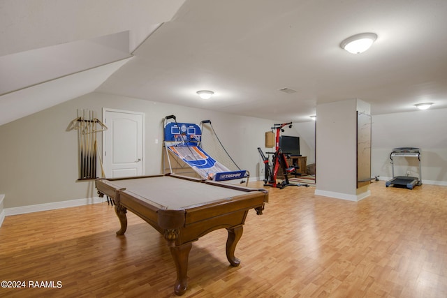 rec room featuring light hardwood / wood-style floors, vaulted ceiling, and billiards