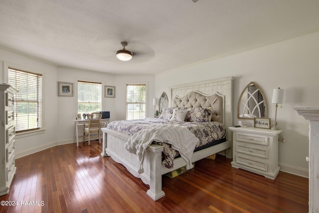 bedroom with ceiling fan, hardwood / wood-style floors, and crown molding