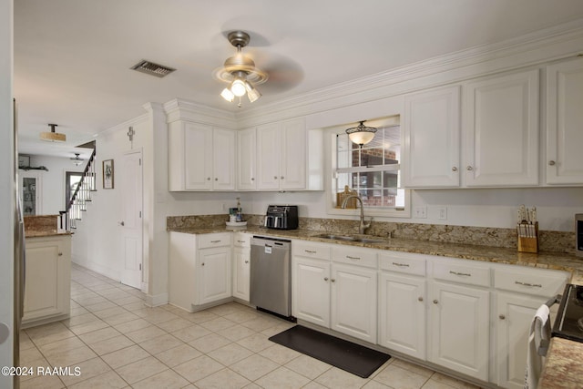 kitchen with light tile patterned floors, dishwasher, white cabinets, ceiling fan, and sink