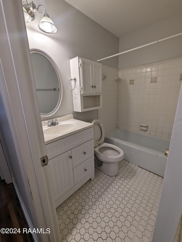 full bath with toilet, shower / bathing tub combination, and vanity