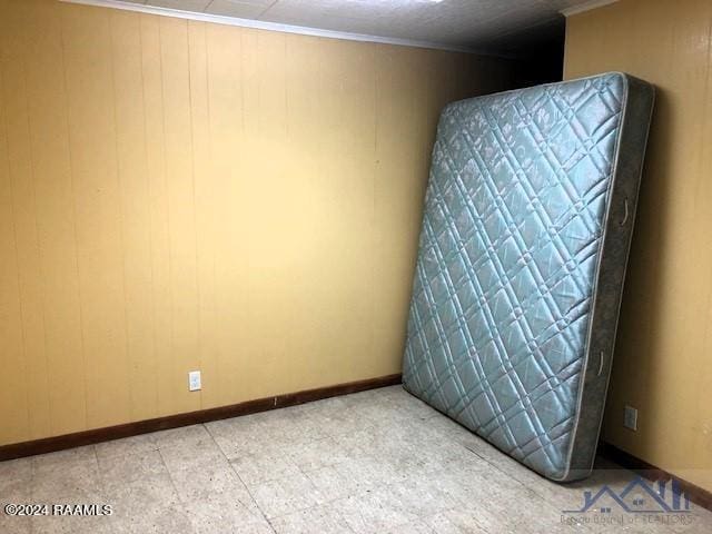 unfurnished bedroom with tile flooring