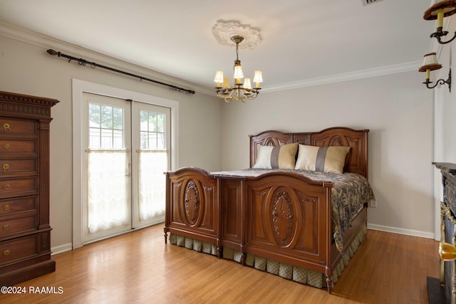 bedroom featuring ornamental molding and light wood-type flooring