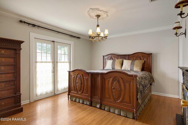 4901 N University Ave, Carencro, LA 70520 - bedroom featuring a chandelier, ornamental molding, and light wood-style floors