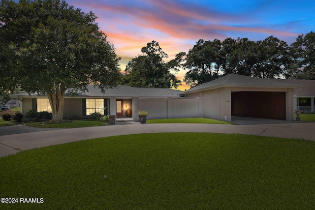 4901 N University Ave, Carencro, LA 70520 - ranch-style house featuring driveway and an attached garage