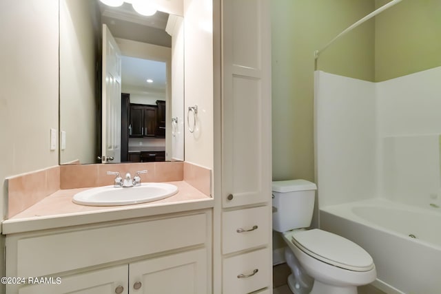 full bathroom featuring shower / bathing tub combination, vanity, and toilet