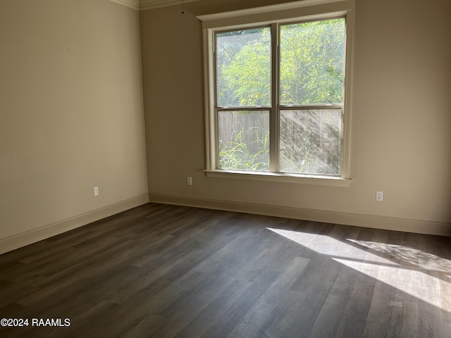 117 Seaside Ln, Lafayette, LA 70506 - spare room featuring dark wood finished floors and baseboards