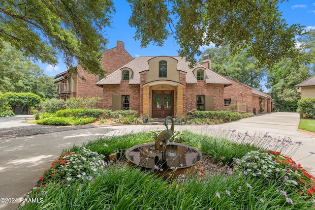 french country home with french doors