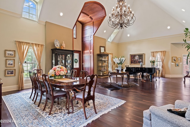 dining area with a chandelier, ornamental molding, high vaulted ceiling, and dark wood-type flooring