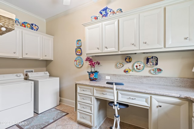 laundry area with washing machine and dryer, crown molding, light tile patterned flooring, and cabinets