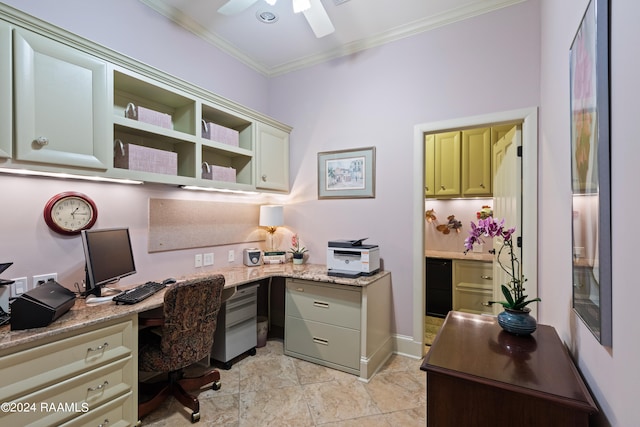 office area with ceiling fan, built in desk, and crown molding