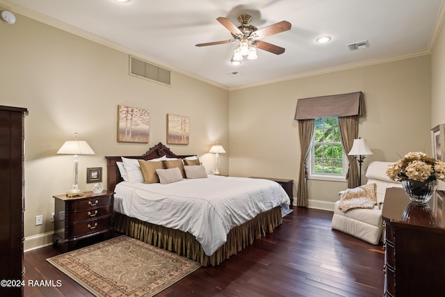 bedroom with ceiling fan, crown molding, and dark wood-type flooring