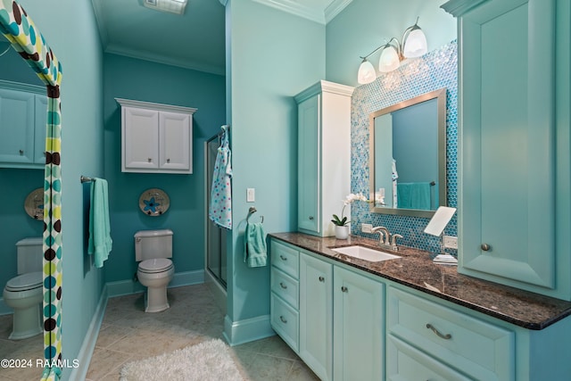 bathroom featuring tile patterned floors, vanity, toilet, and ornamental molding