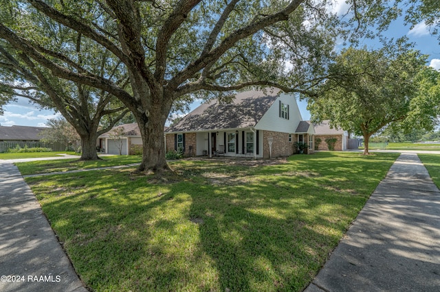 view of front facade featuring a garage and a front lawn