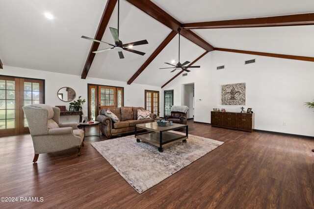 living room featuring beam ceiling, dark hardwood / wood-style flooring, french doors, and high vaulted ceiling