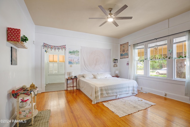 bedroom featuring ceiling fan and light wood-type flooring