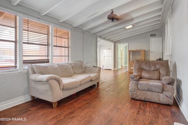 living room featuring vaulted ceiling with beams and hardwood / wood-style flooring