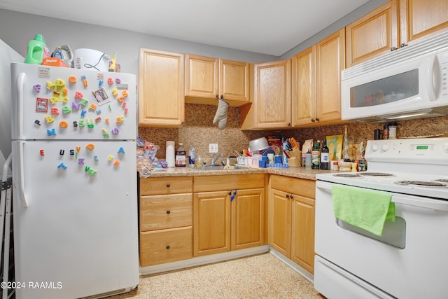 kitchen with white appliances, sink, tasteful backsplash, and light brown cabinets