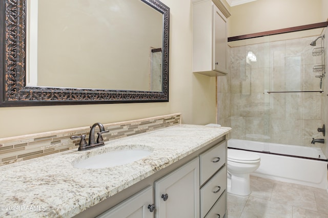 full bathroom featuring tile patterned flooring, enclosed tub / shower combo, toilet, backsplash, and vanity