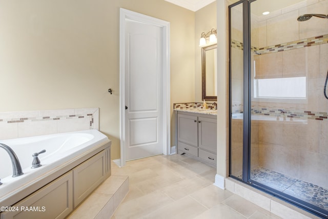 bathroom with independent shower and bath, vanity, crown molding, and tile patterned flooring