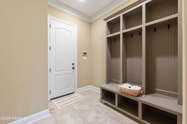 mudroom featuring light tile patterned floors, ornamental molding, and baseboards