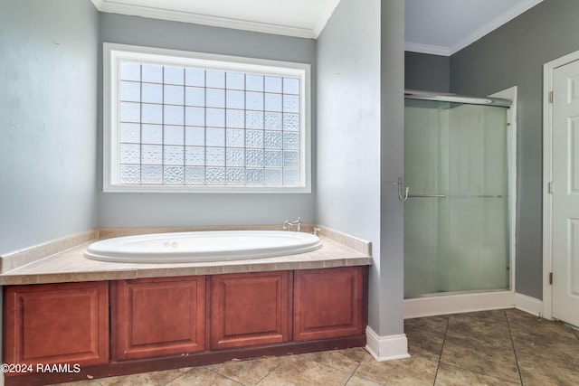 bathroom featuring tile patterned flooring, separate shower and tub, and ornamental molding