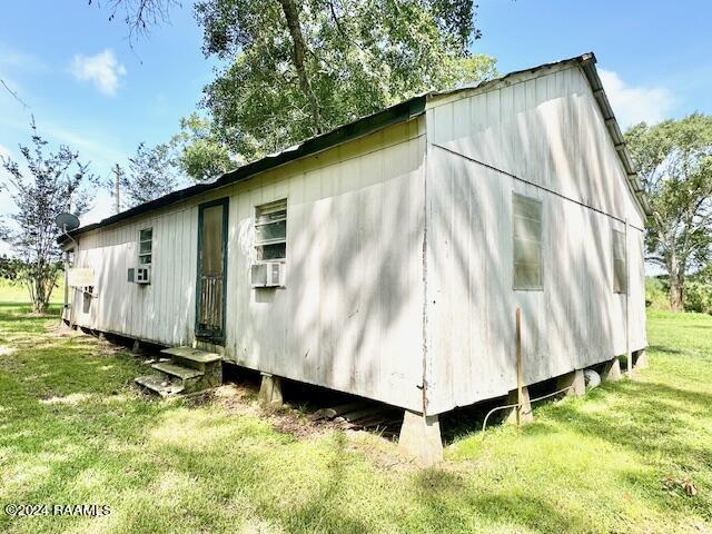 exterior space with a yard