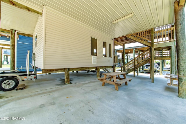 view of patio / terrace featuring a carport