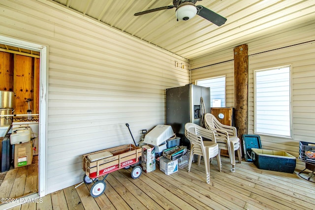 wooden deck with ceiling fan