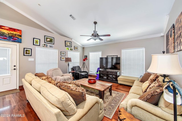 living room with ceiling fan, crown molding, lofted ceiling, and dark wood-type flooring