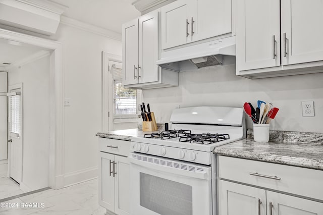 kitchen with white cabinetry, ornamental molding, light stone counters, and white range with gas stovetop